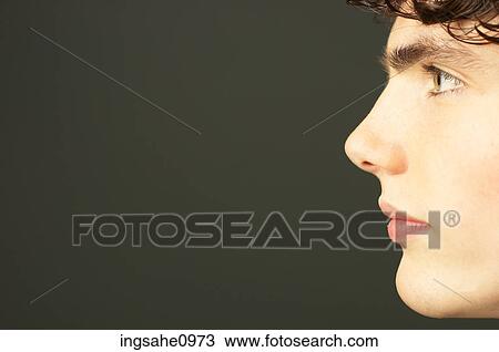 Teenaged boy in side profile View Large Photo Image Stock Image - Teenaged boy in side profile. Fotosearch