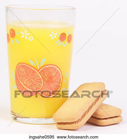 Vanilla cookies and glass of orange juice L2 View Large Photo Image Stock Photography - Vanilla cookies and glass of orange juice L2. Fotosearch