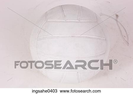 Stock Image - White leather volleyball. Fotosearch