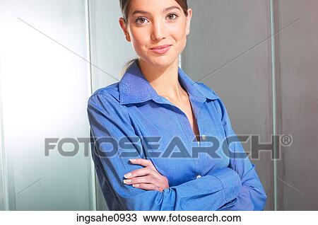 Woman standing in french blue shirt View Large Photo Image Stock Image - Woman standing in french blue shirt. Fotosearch