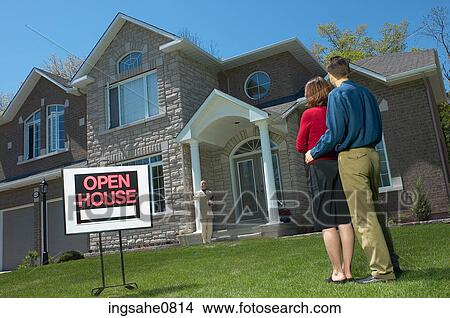 Young couple at real estate open house View Large Photo Image Picture - Young couple at real estate open house. Fotosearch
