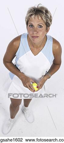 adult woman in tennis clothes View Large Photo Image Stock Image - adult woman in tennis clothes . Fotosearch