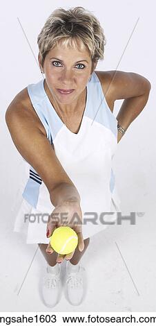adult woman in tennis clothes View Large Photo Image Stock Image - adult woman in tennis clothes . Fotosearch