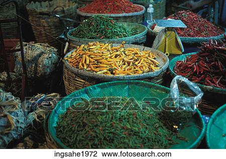 Stock Image - Baskets of hot peppers . Fotosearch