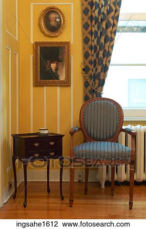 Stock Image - Blue chair and side table BE. Fotosearch