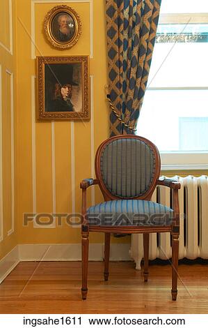 Blue chair in yellow and white room BE View Large Photo Image Stock Image - Blue chair in yellow and white room BE. Fotosearch