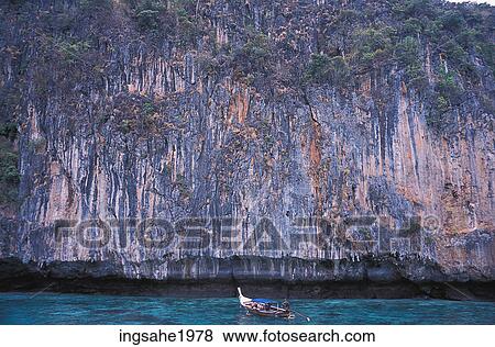 Boat near cliff View Large Photo Image Stock Photo - Boat near cliff. Fotosearch