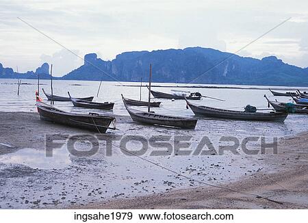 Stock Photo - Boats on the beach . Fotosearch