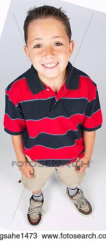 boy standing with stripped shirt View Large Photo Image Stock Image - boy standing with stripped shirt . Fotosearch