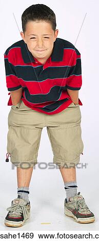 boy standing with stripped shirt View Large Photo Image Stock Photo - boy standing with stripped shirt . Fotosearch