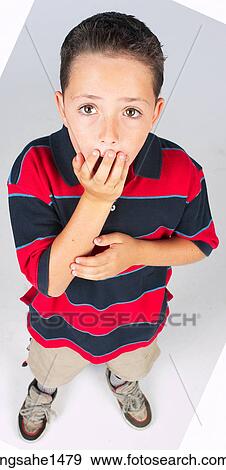 boy standing with stripped shirt View Large Photo Image Stock Photo - boy standing with stripped shirt . Fotosearch