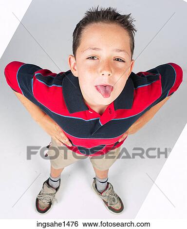 Stock Photograph - boy standing with stripped shirt . Fotosearch