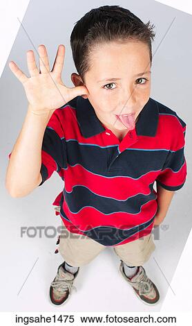 boy standing with stripped shirt View Large Photo Image Stock Photography - boy standing with stripped shirt . Fotosearch