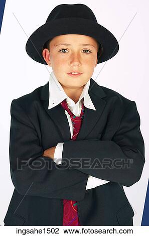 boy wearing adult suit View Large Photo Image Stock Image - boy wearing adult suit . Fotosearch