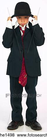 boy wearing adult suit View Large Photo Image Stock Photo - boy wearing adult suit . Fotosearch
