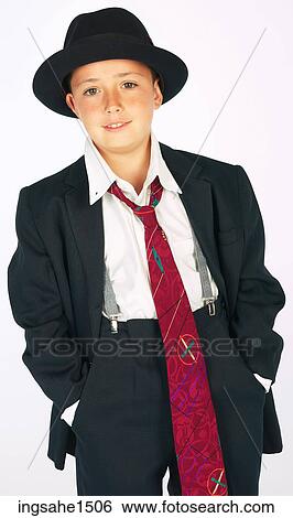 Stock Photograph - boy wearing adult suit . Fotosearch
