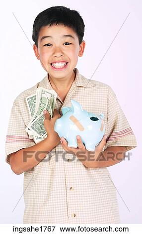 boy with piggy bank BE 12 View Large Photo Image Stock Photo - boy with piggy bank BE 12. Fotosearch