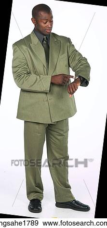 business man looking at watch BE View Large Photo Image Stock Photo - business man looking at watch BE. Fotosearch
