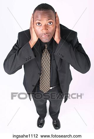 Businessman covering ears a82 View Large Photo Image Stock Image - Businessman covering ears a82. Fotosearch