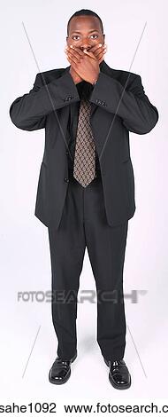 Businessman covering mouth a81 View Large Photo Image Stock Image - Businessman covering mouth a81. Fotosearch