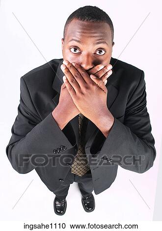 Businessman covering mouth a82 View Large Photo Image Stock Image - Businessman covering mouth a82. Fotosearch
