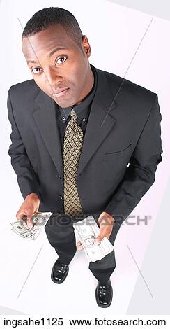 Businessman holding money a85 View Large Photo Image Stock Photography - Businessman holding money a85. Fotosearch