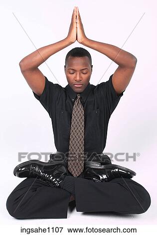 Businessman meditating a83 View Large Photo Image Stock Photo - Businessman meditating a83. Fotosearch