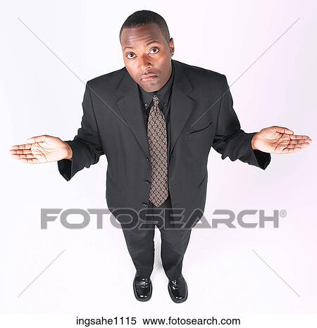 Businessman shrugging shoulders a83 View Large Photo Image Stock Photography - Businessman shrugging shoulders a83. Fotosearch