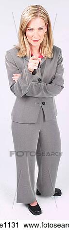 Stock Image - Businesswoman pointing finger. Fotosearch