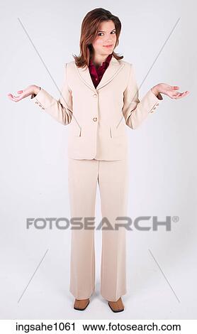Stock Image - Businesswoman shrugging shoulders a81. Fotosearch
