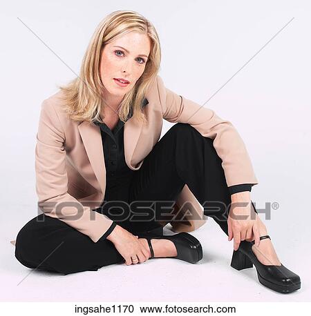 Businesswoman sitting casually on floor a81 View Large Photo Image Stock Image - Businesswoman sitting casually on floor a81. Fotosearch
