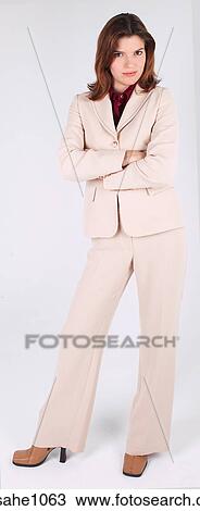 Businesswoman standing with arms folded a81 View Large Photo Image Stock Image - Businesswoman standing with arms folded a81. Fotosearch