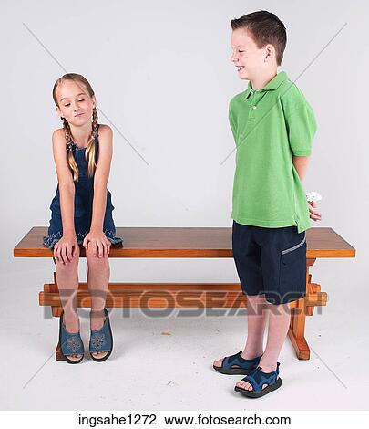 Children near wooden bench View Large Photo Image Stock Image - Children near wooden bench . Fotosearch