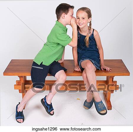 Children telling secrets View Large Photo Image Stock Photograph - Children telling secrets . Fotosearch