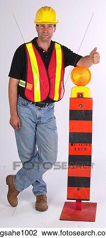 Construction worker leaning on beacon View Large Photo Image Stock Image - Construction worker leaning on beacon. Fotosearch