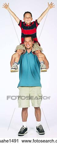 Stock Image - Father and son together . Fotosearch