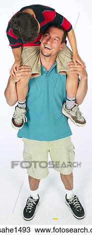 Stock Image - Father and son together . Fotosearch