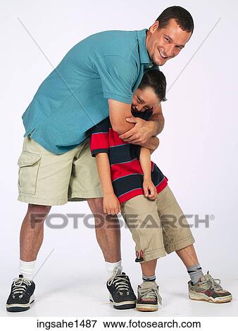 Stock Photo - Father and son together . Fotosearch