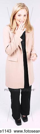 Stock Image - Giggling businesswoman. Fotosearch