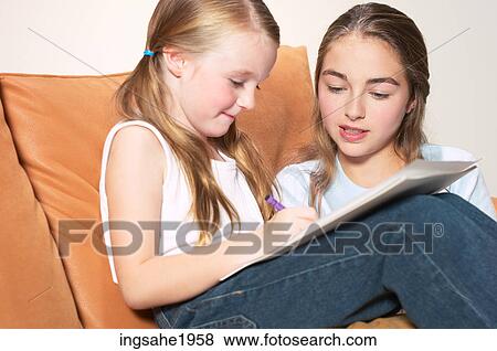 Stock Photo - Girl drawing picture BE 2. Fotosearch