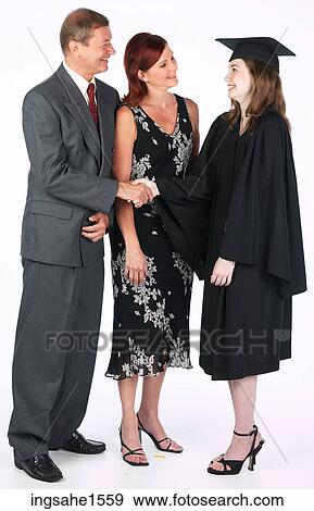 Stock Photo - graduation girl with parents . Fotosearch