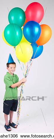 Little boy with bunch of balloons View Large Photo Image Stock Photograph - Little boy with bunch of balloons . Fotosearch
