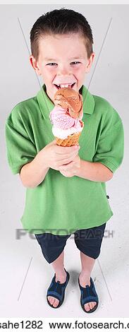 Little boy with ice cream cone View Large Photo Image Stock Image - Little boy with ice cream cone . Fotosearch