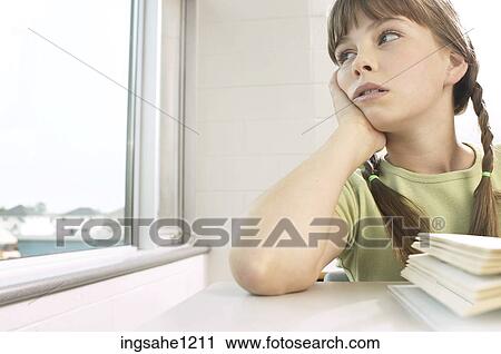 Little girl daydreaming out classroom window 1 View Large Photo Image Stock Image - Little girl daydreaming out classroom window 1. Fotosearch