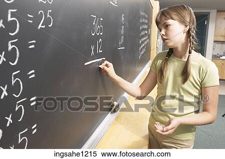 Little girl doing math equations on the blackboard 1 View Large Photo Image Stock Photography - Little girl doing math equations on the blackboard 1. Fotosearch
