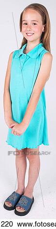Little girl in blue dress View Large Photo Image Stock Image - Little girl in blue dress . Fotosearch