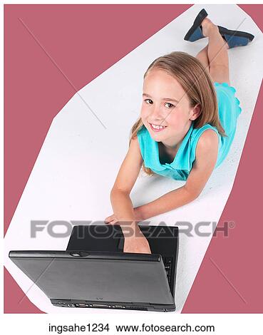 Little girl using laptop View Large Photo Image Picture - Little girl using laptop . Fotosearch