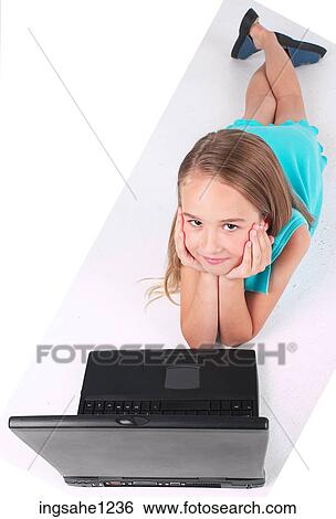 Little girl using laptop View Large Photo Image Stock Photograph - Little girl using laptop . Fotosearch