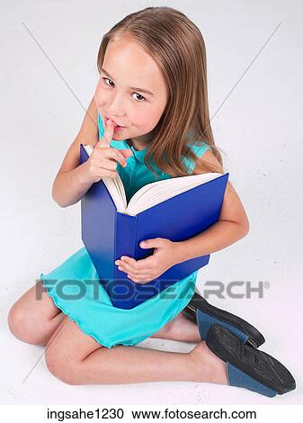 Little girl with blue book View Large Photo Image Stock Image - Little girl with blue book . Fotosearch