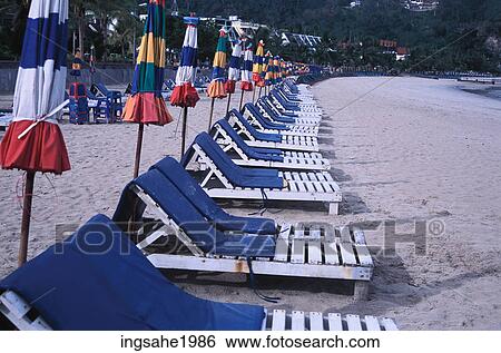 Lounge chairs on beach View Large Photo Image Stock Photograph - Lounge chairs on beach. Fotosearch